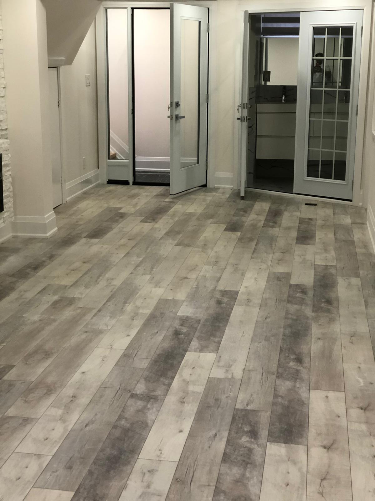 Bathroom renovation with glass shower and polished tile finishes