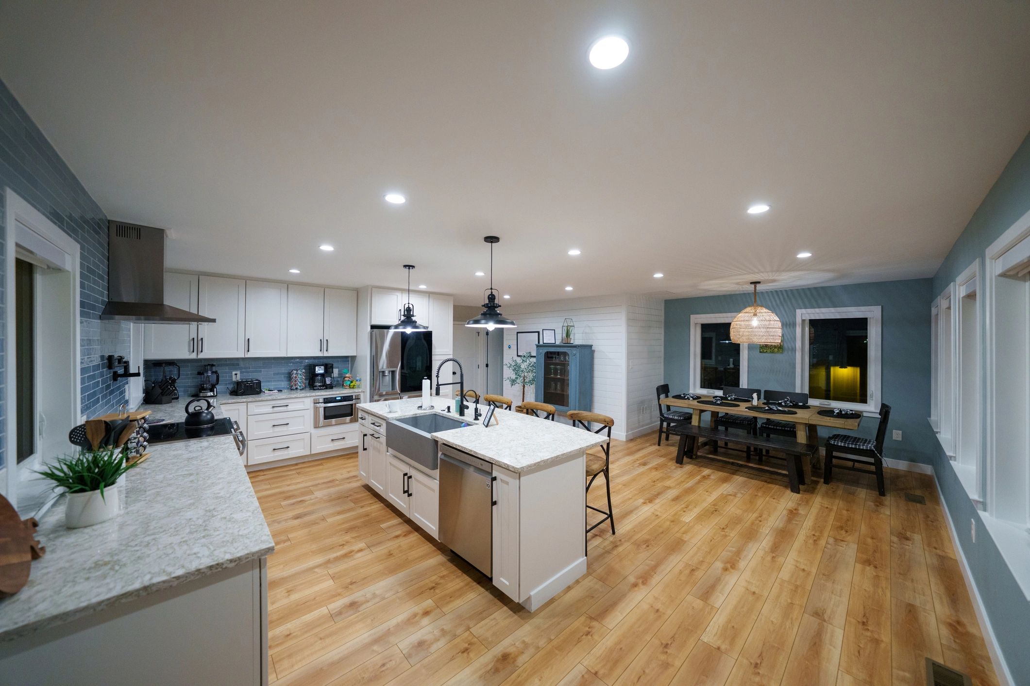 Kitchen with blue tile backsplash